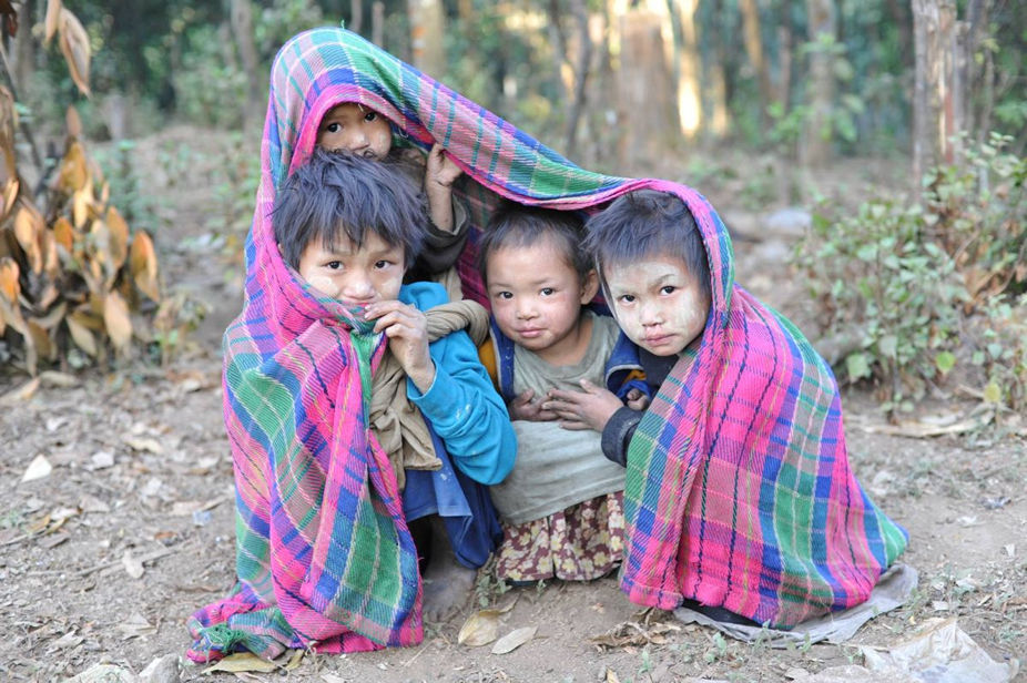 IDP kids under a blanket 926
