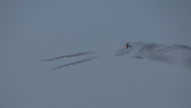 MI24 helicopter firing rockets at Kachin positions 28 December, 2012