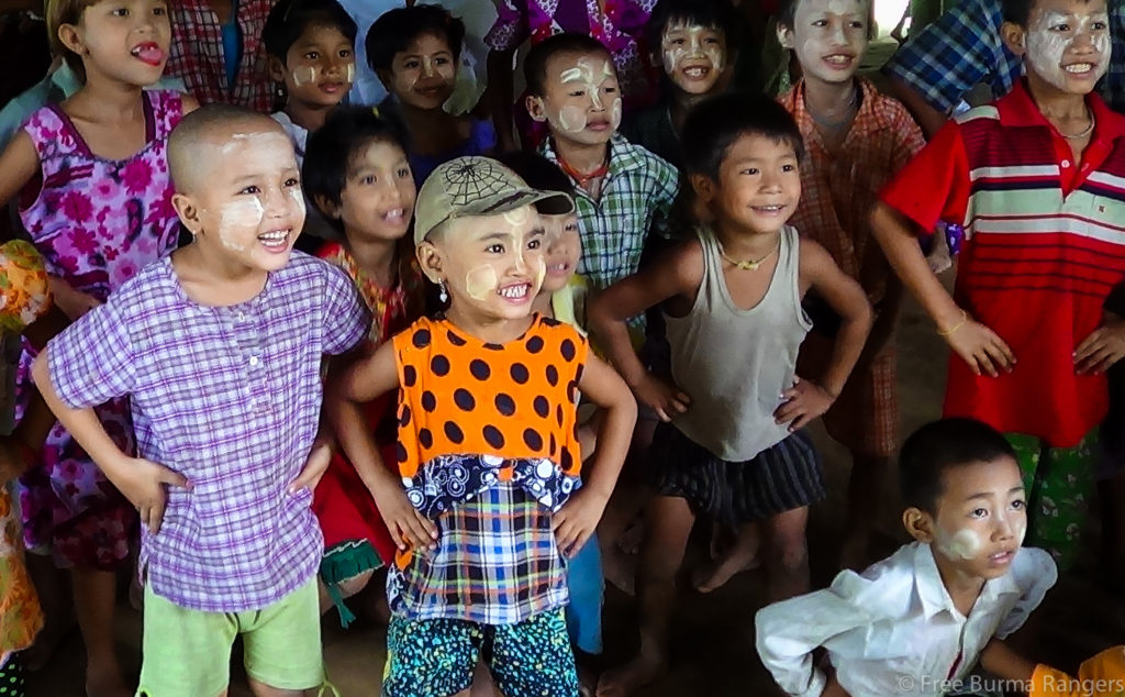 Children laugh and sing along with rangers during a GLC program.