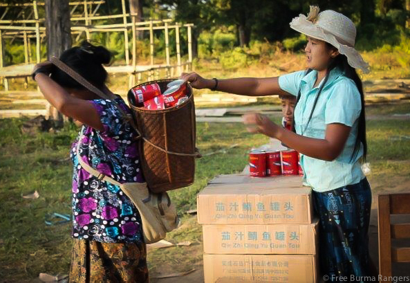Cans of fish were passed out to IDPs.