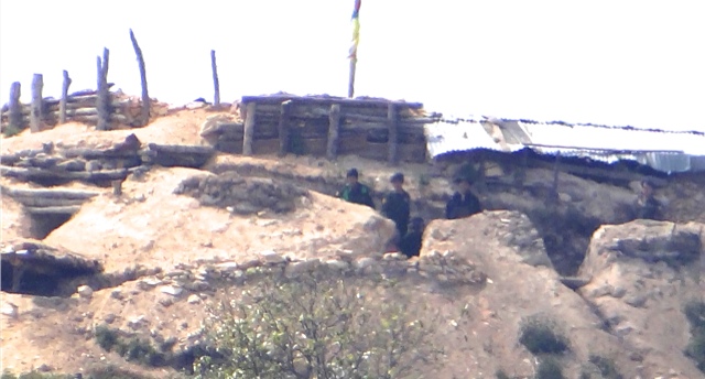Opium Militia oversee Opium fields in Pansay area Northern Shan State Burma 21 Feb 2014