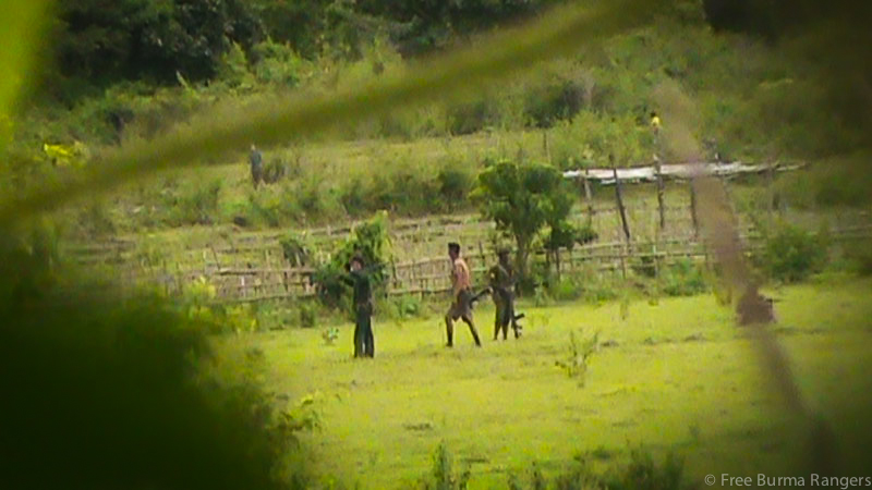 Burma Army soldiers patrolling the villages that FBR teams performed relief missions in
