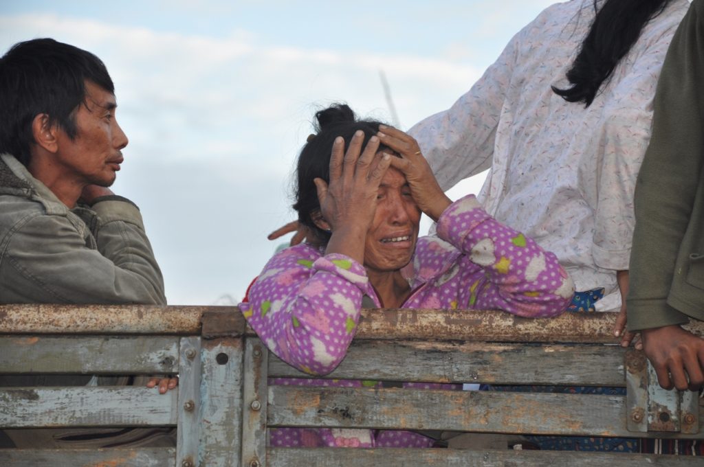 Kachin woman forced by Burma Army attacks to flee her home.