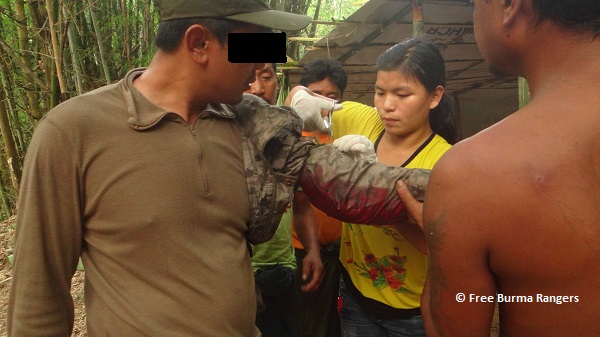 FBR Cameraman receives first aid after being hit by mortar shrapnel