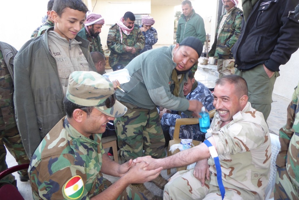 Eliya gives medical training at the front line