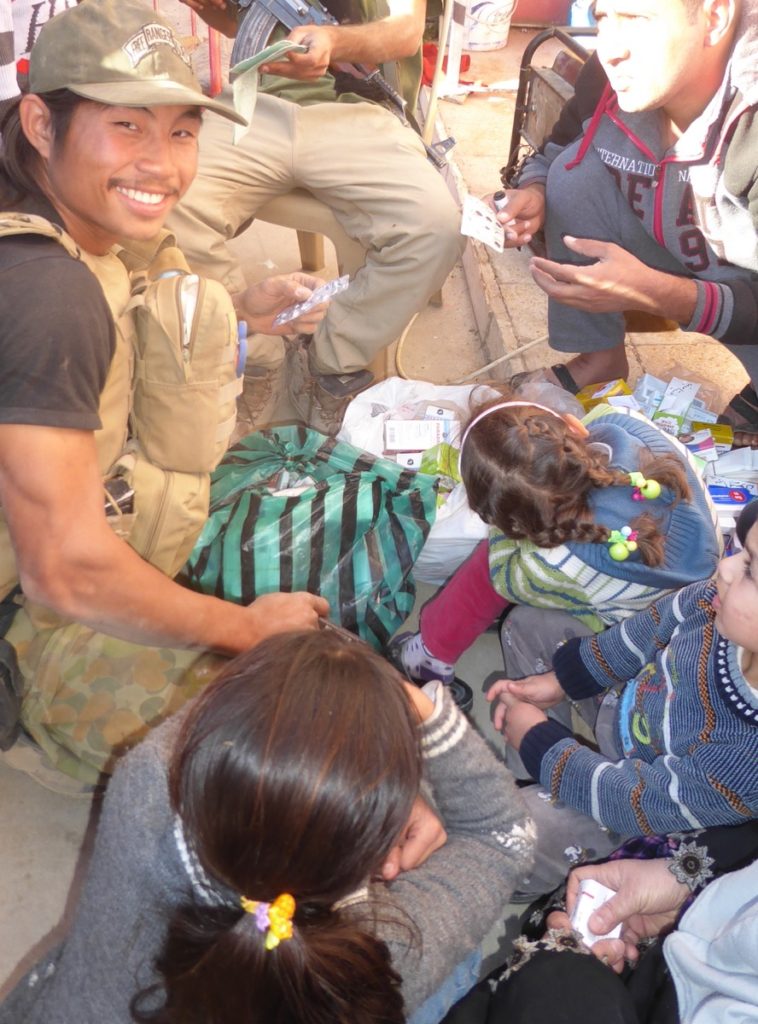 Joseph, Karen FBR medic form Burma treats families in Mosul. Photo: FBR.