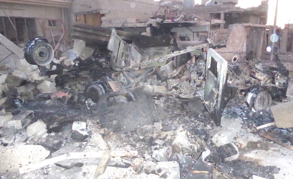 The remains of an Iraqi Hummvee where an Iraqi Soldier was killed by a ISIS suicide bomber trying to reach us. Photo: FBR.