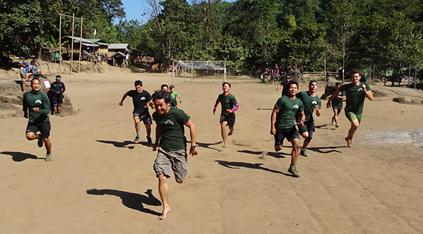 Karen, Shan, Kachin, Kurd/Iraqi, Italian and American rangers race each other in the 100-yard dash of the reunion games.